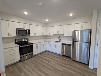 Upgraded apartment floorplans feature stainless steel appliances, custom cabinets, upgraded design finishes